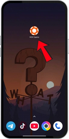 Ikona aplikacije Vox Casino na namizju telefona, pripravljena za zagon